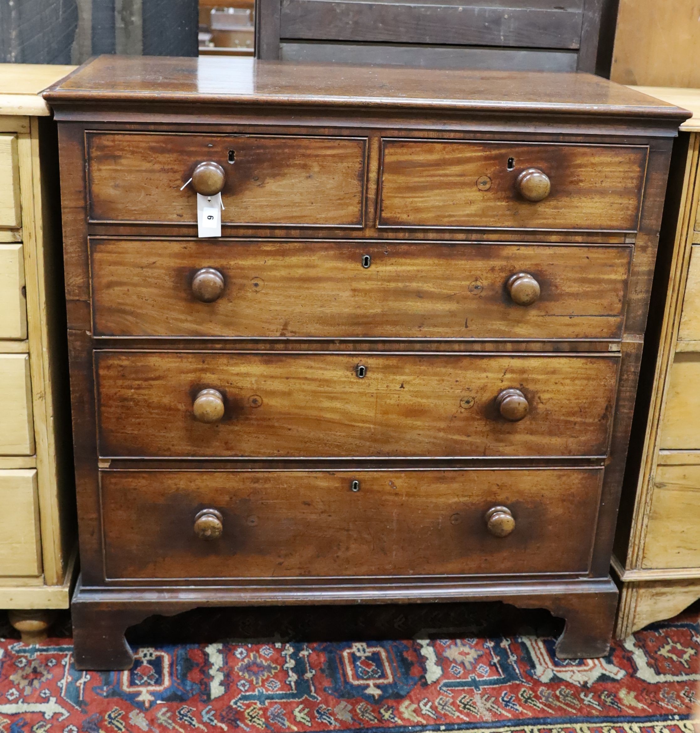 A George III mahogany two part chest, width 101cm, depth 51cm, height 106cm